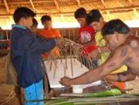 elders and youths building a model of a traditional panara house brazil 2007 e ewart